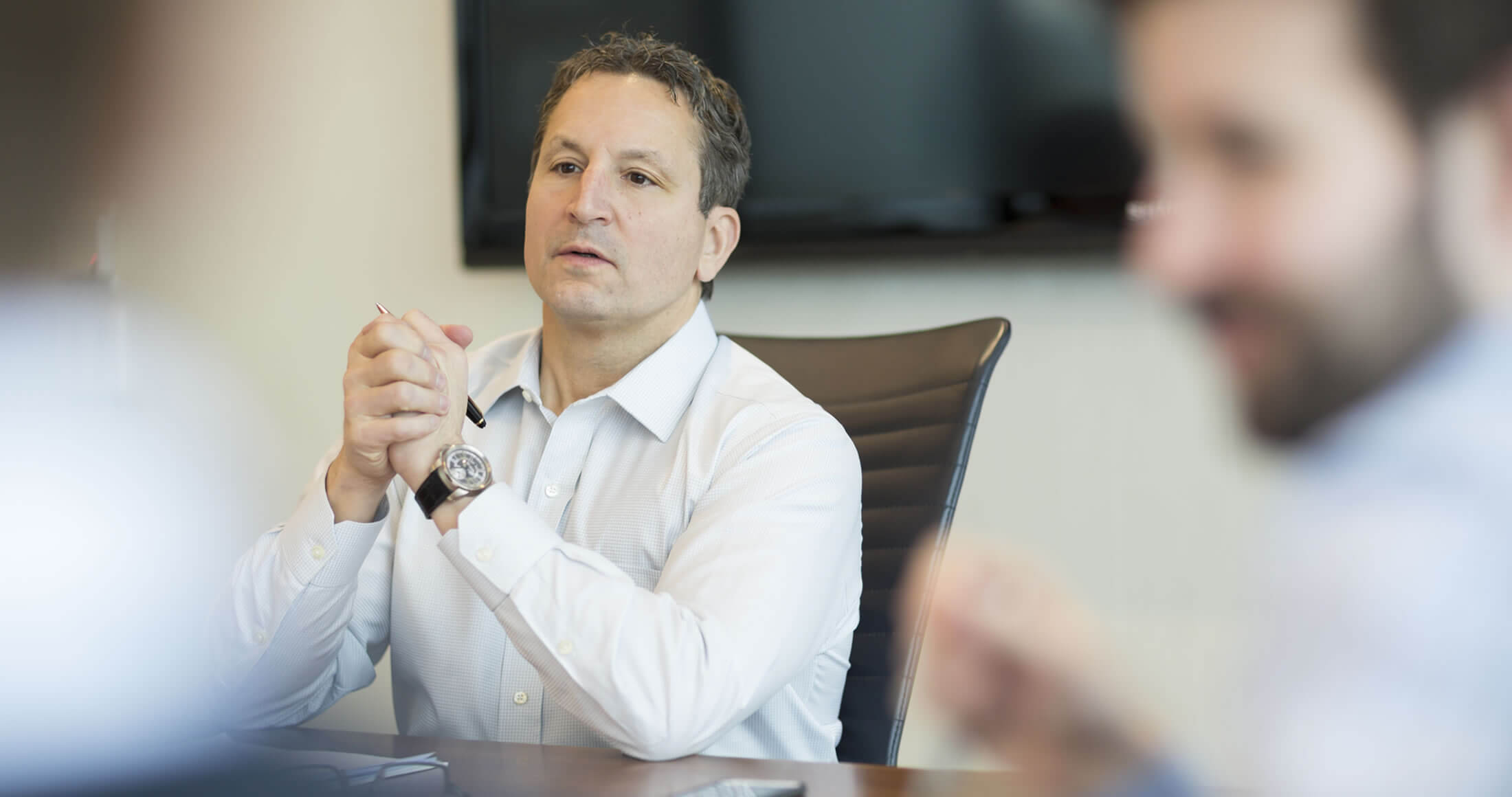 David Herro- Portfolio Manager- in a meeting